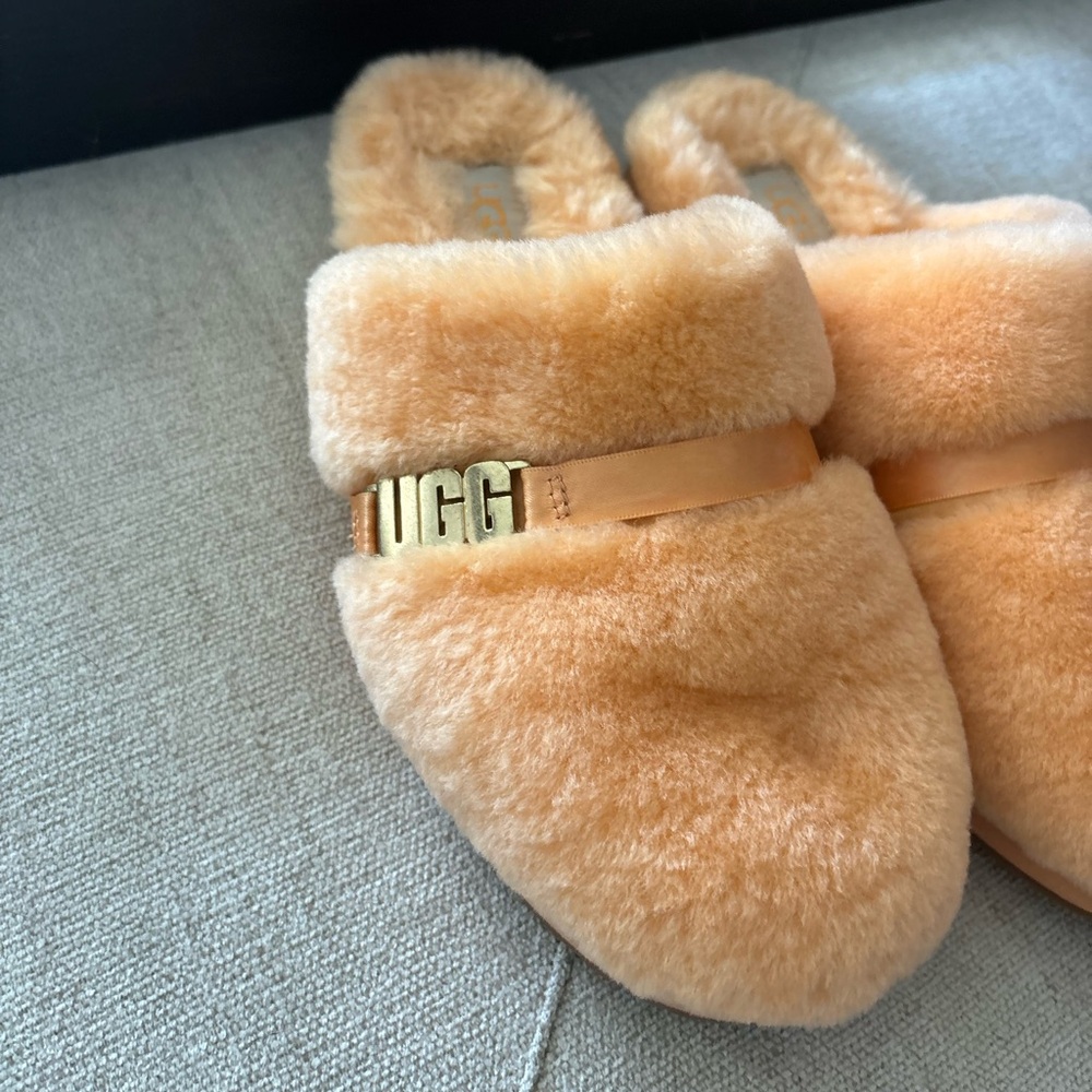Peachy, pink colored UGG slippers!